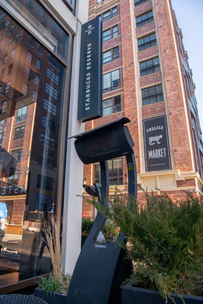 Black portable Bromic heater outside New York's Starbucks Reserve